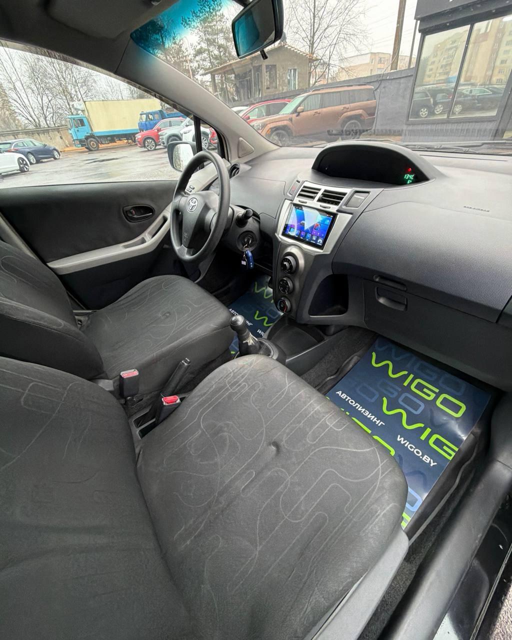 Toyota Yaris II (XP9) · Рестайлинг , 2009 г., механика, бензин - фото 12