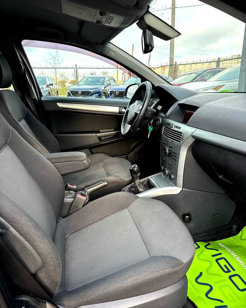 Opel Astra H · Рестайлинг , 2011 г., механика, бензин - фото 11