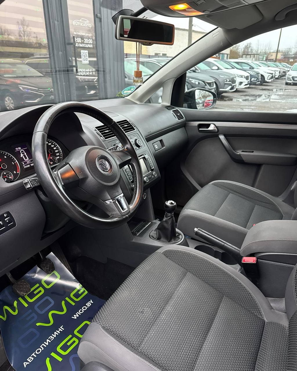 Volkswagen Touran I · 2-й рестайлинг , 2011 г., механика, дизель - фото 8