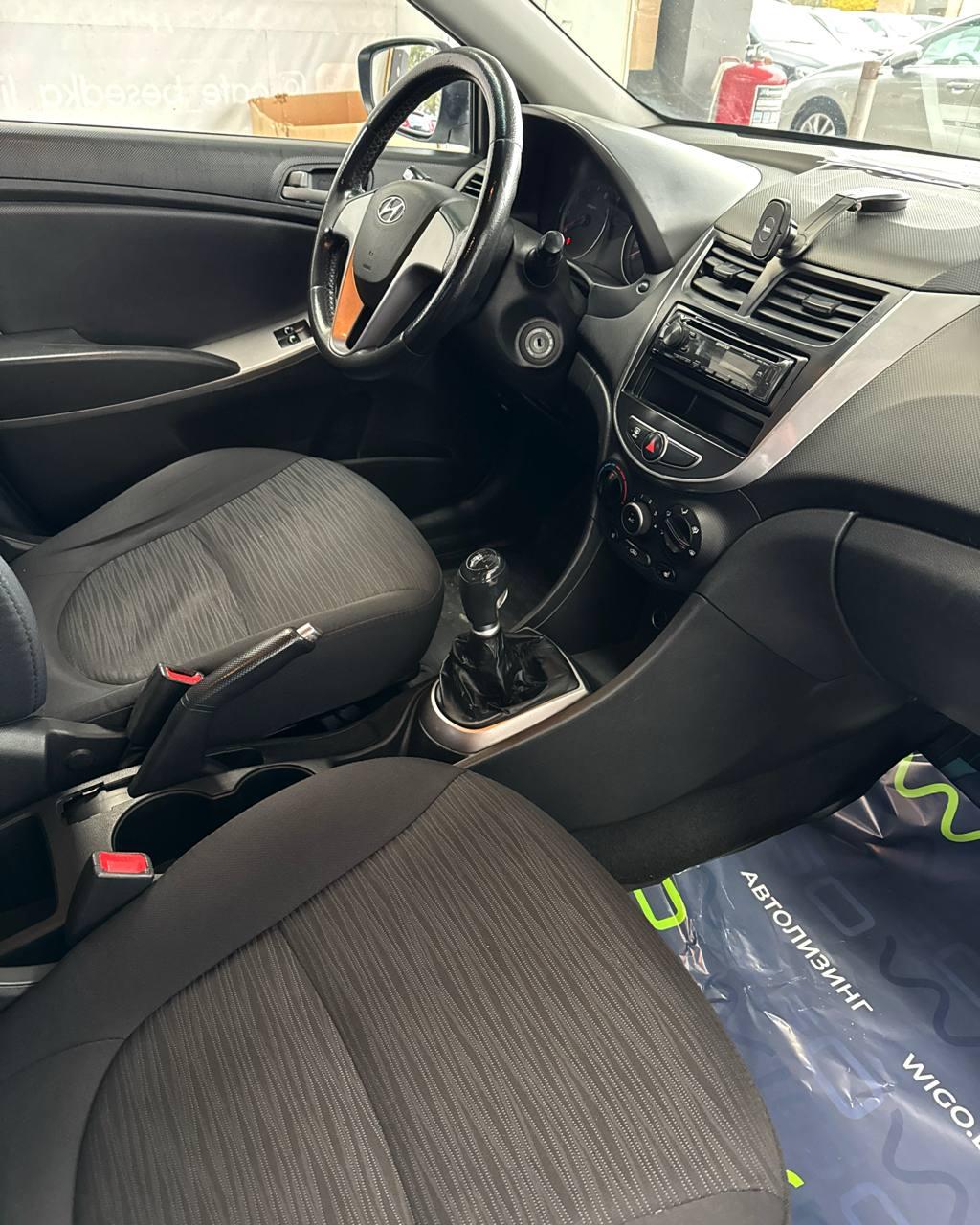 Hyundai Solaris I · Рестайлинг , 2015 г., механика, бензин - фото 13