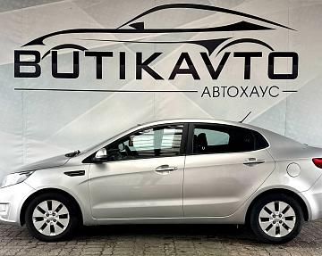 Kia Rio III - фото 4
